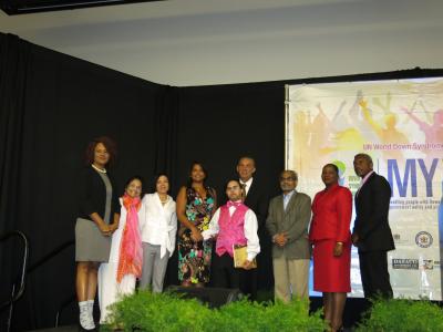 Photo Caption: His Excellency, Anthony Aquinas Carmona, President of the Republic of Trinidad and Tobago and Her Excellency Reema Carmona, after presenting Sujeet Desai with a book by the late historian/author Angelo Bissessarsingh. Also in the photo are (L-R) the Honourable Ayana Webster-Roy, Minister of Gender and Child Affairs, Office of the Prime Minister, Mrs Sindoor Desai, Ms Tisha Lee, Republic Bank Group Corporate Communications Manager, Dr Desai, the Honourable Cherrie Ann Crichlow-Cockburn, Minister of Social Development and Family Services and Glen Niles, President and Founder of the DSFN. (Photo Courtesy: Ministry of Social Development and Family Services)