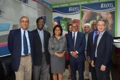 Caption: Senator the Honourable Clarence Rambharat, Minister of Agriculture, Land and Fisheries (4th from right) and Senator Paula Gopee-Scoon, Minister of Trade and Industry (6th from right) stand with representatives of Grand Bay Paper Products ahead of their facility tour. (Photo courtesy the Ministry of Agriculture, Land and Fisheries)