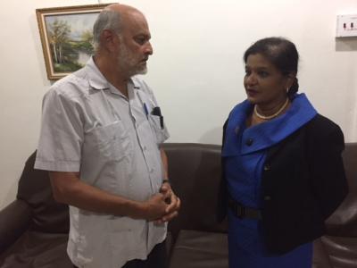 Agricultural Officer for the County Victoria Office of the Ministry of Agriculture, Land and Fisheries (MALF), Ms. Sati Gangapersad (right), converses with former Agriculture Minister, Dr. Reeza Mohammed, following her conduct of a Locust Stakeholder Sensitization Session at the Enchanted Gardens Banquet Hall in New Grant on Wednesday 22nd November, 2017.