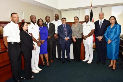 Senator the Honourable Rohan Sinanan, Minister of Works and Transport (centre) is joined by (l-r) Mr. Lennox Bailey; Ms. Reeti Maharajh; Lt. Commander Aldon Jasper; Mrs. Joanne Edwards-Alleyne; Mr. Ronald Alfred (Chairman); Mr. Kurt Duncan; Mrs. Sonia Francis-Yearwood (Permanent Secretary in the Ministry of Works and Transport); Lt. Commander Zin-Mark King; Mr. Lenin Oliviere and Ms. Sarika Harripersad-Mohammed.
