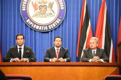 Photo Caption: (L-R) The Honourable Faris Al Rawi, Attorney General; the Honourable Stuart Young, Minister in the Office of the Prime Minister and Minister in the Ministry of the Attorney General and Legal Affairs and the Honourable Colm Imbert, Minister of Finance address the media at the weekly Post Cabinet Press Briefing. (Photo Courtesy: Office of the Prime Minister)