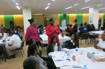 Caption: Minister of Social Development and Family Services, the Honourable Cherrie-Ann Crichlow-Cockburn (r) and Permanent Secretary, Jacinta Bailey-Sobers (l) meet and hear the views of participants at the Consultation on Friday, 2 June 2017. (Photo courtesy the Ministry of Social Development and Family Services)