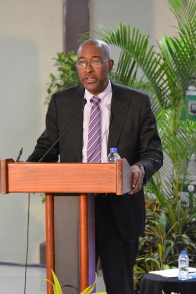 Senator the Honourable Robert Le Hunte, Minister of Public Utilities, addresses the residents of Sangre Grande
