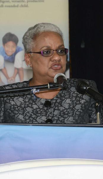 The Permanent Secretary, Ministry of Education Angela Sinaswee-Gervais delivers the feature address at the Pan in the Schools Coordinating Council Cheque Presentation Ceremony